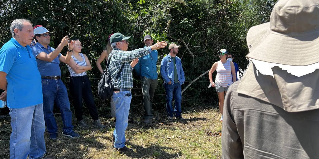 Julio Alegre introduces partners from Purdue University, University of Oklahoma and CIAT to the demonstration farms and pastures at Pucayacu, Peru