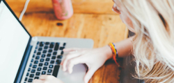 Female student works on a laptop