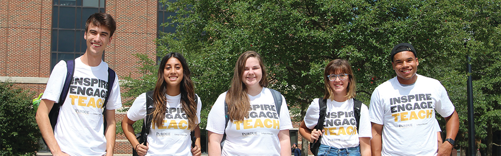 College of Education Students standing in front of Beering Hall.