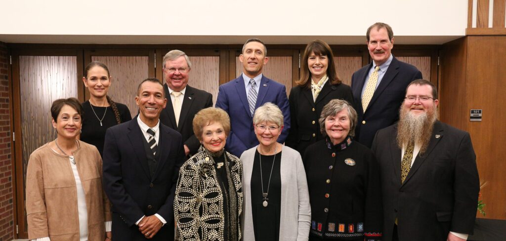 Purdue Distinguished Education Alumni smiling for a photo.