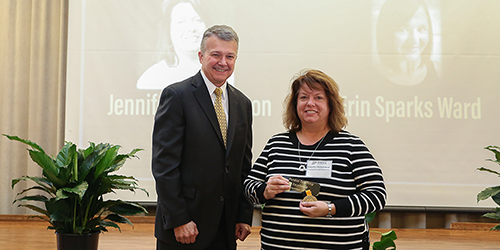 Jennifer Richardson receives a Teaching Academy Teaching Excellence Award from Jay T. Akridge, Provost and Executive Vice President for Academic Affairs and Diversity