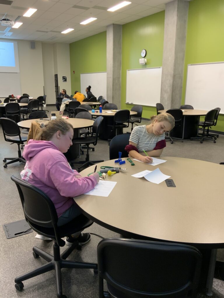 Students use a piece of assistive technology