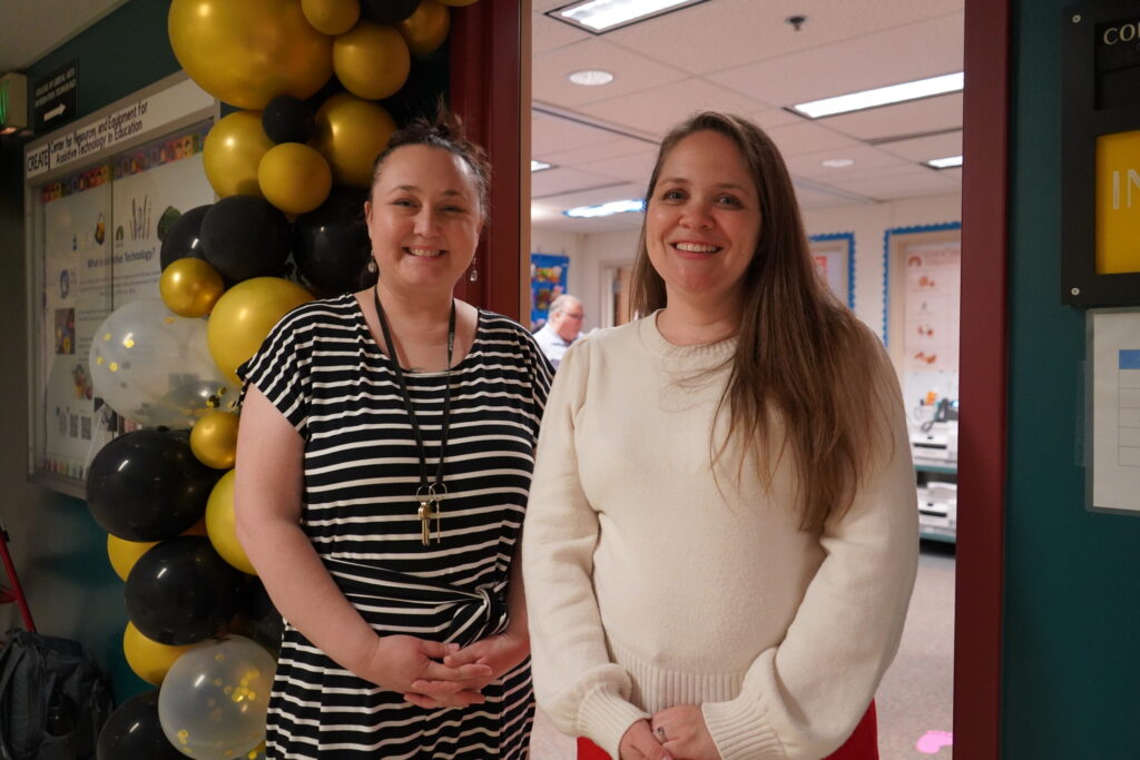 Drs. Begeske and Smith stand in the doorway of their newly opened center, CREATE