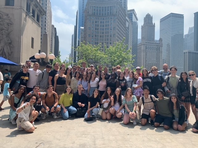 A large group of BFTF students standing in front of the Michigan River in Chicago.