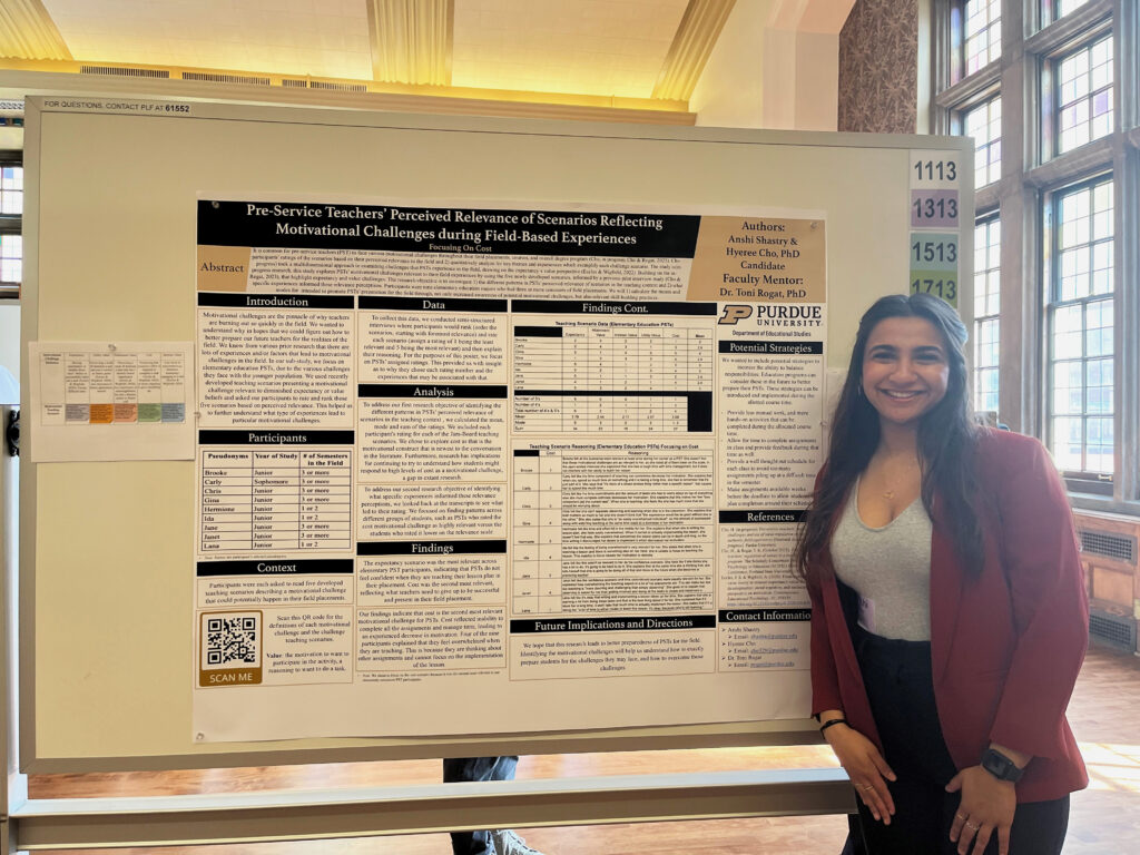Anshi Shastry standing in front of her research poster, titled "Pre-Service Teachers’ Perceived Relevance of Scenarios Reflecting Motivational Challenges during Field-Based Experiences."