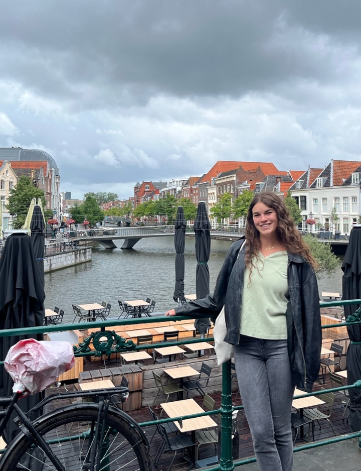 Paige Fulkerson overlooking a beautiful river in Leiden.
