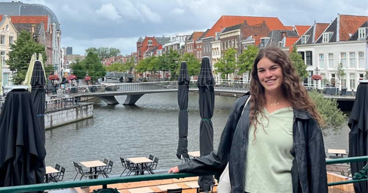 Paige Fulkerson overlooking a beautiful river in Leiden.
