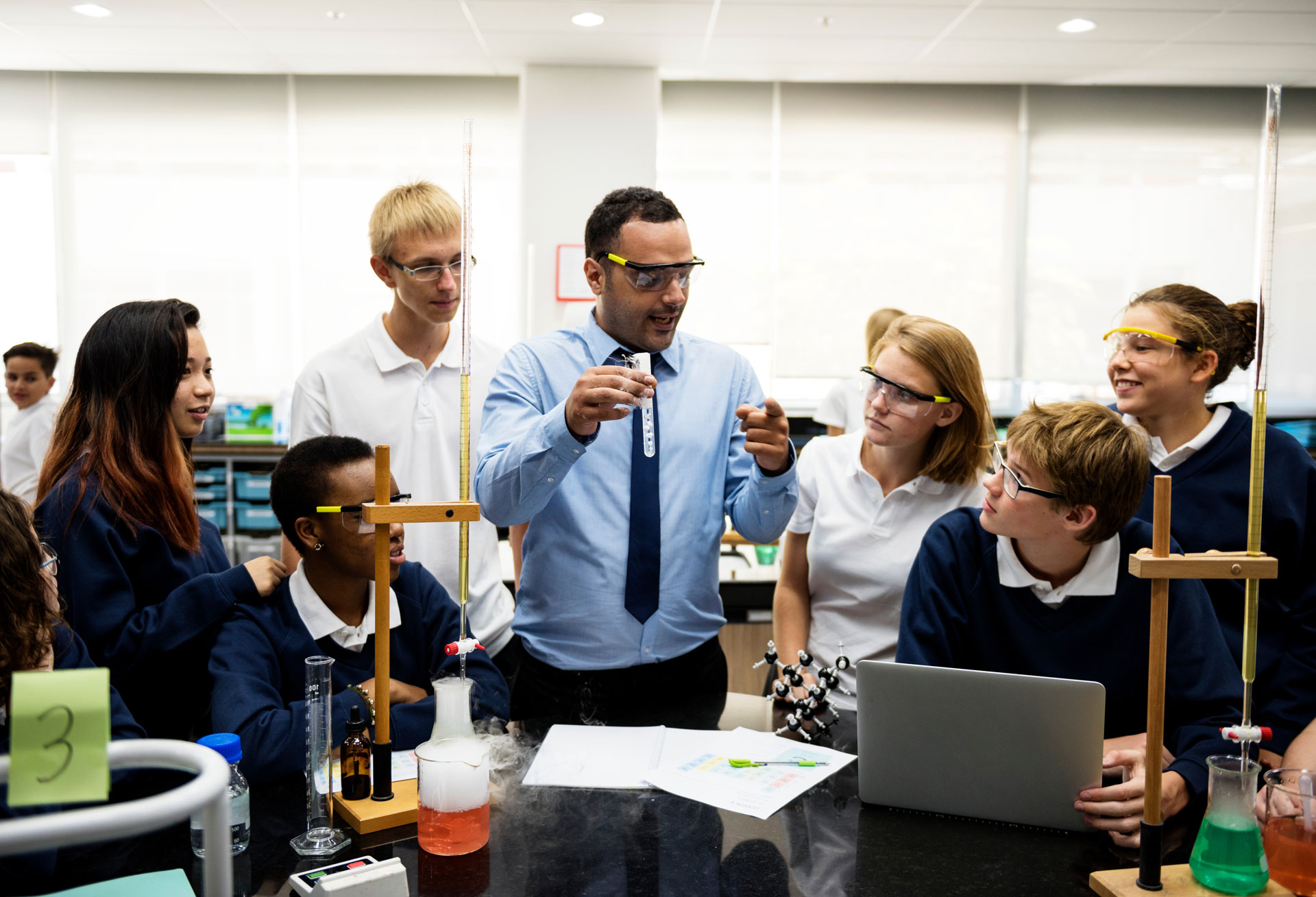 A group of students in a discussion in a classroom