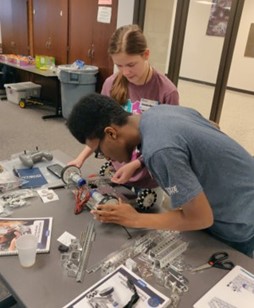 INGU students tinker with robotics during summer camp and after-school programming.