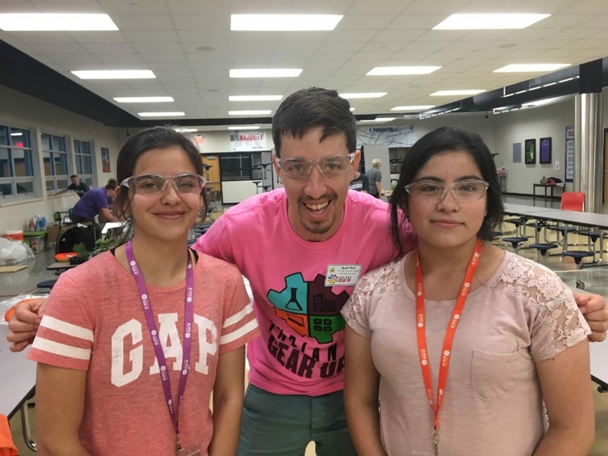 Two INGU students pose with Purdue electrical engineering student Asaf Orel. 