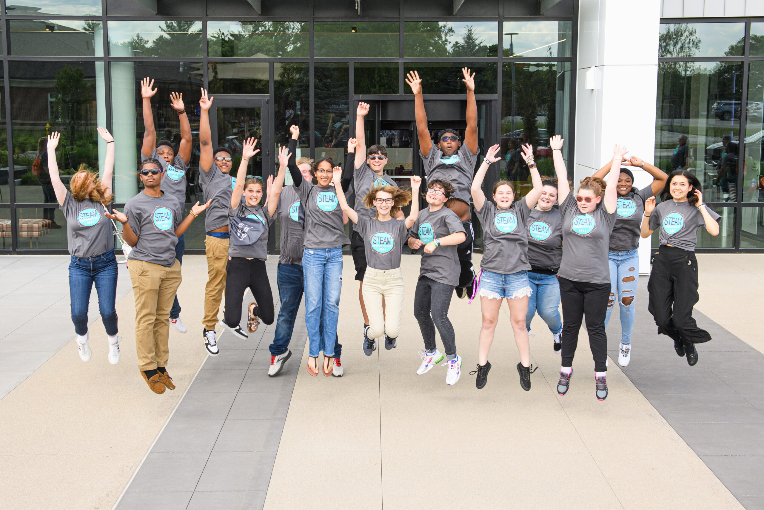 Indiana GEAR UP students jump for joy during a summer STEM Leadership Institute session at Purdue University.