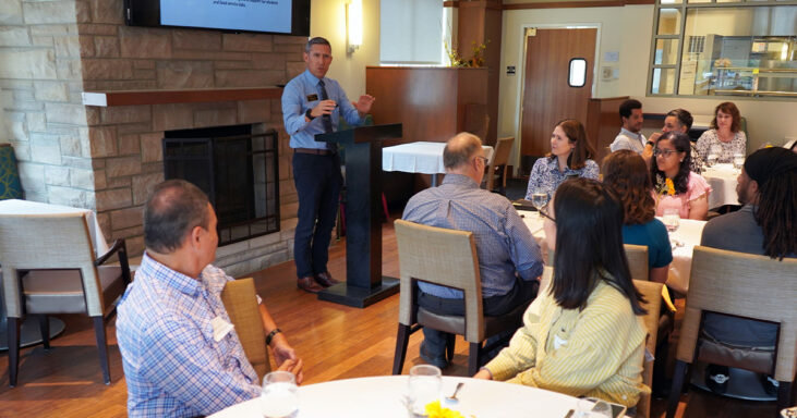 Interim dean Phil VanFossen speaking to attendees of the Fall Doctoral Awards ceremony.