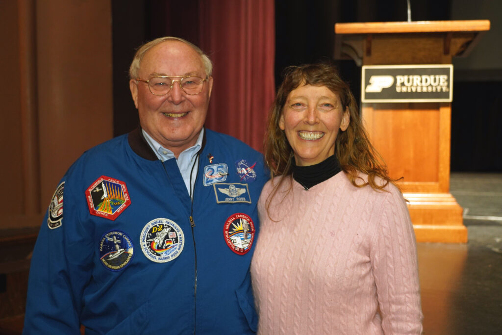 A waist up, front facing view of Jerry and Amy Ross smiling for a photo.