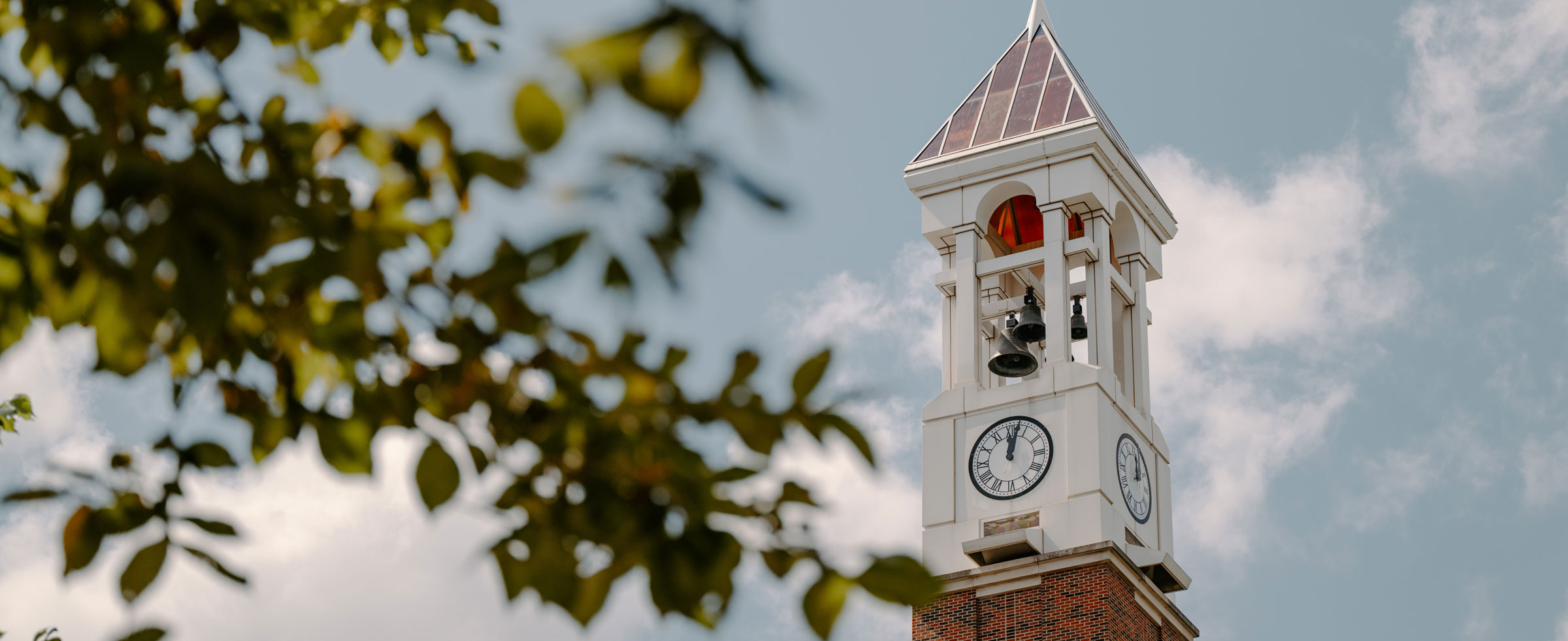 The Purdue University clock tower shown on a summer evening