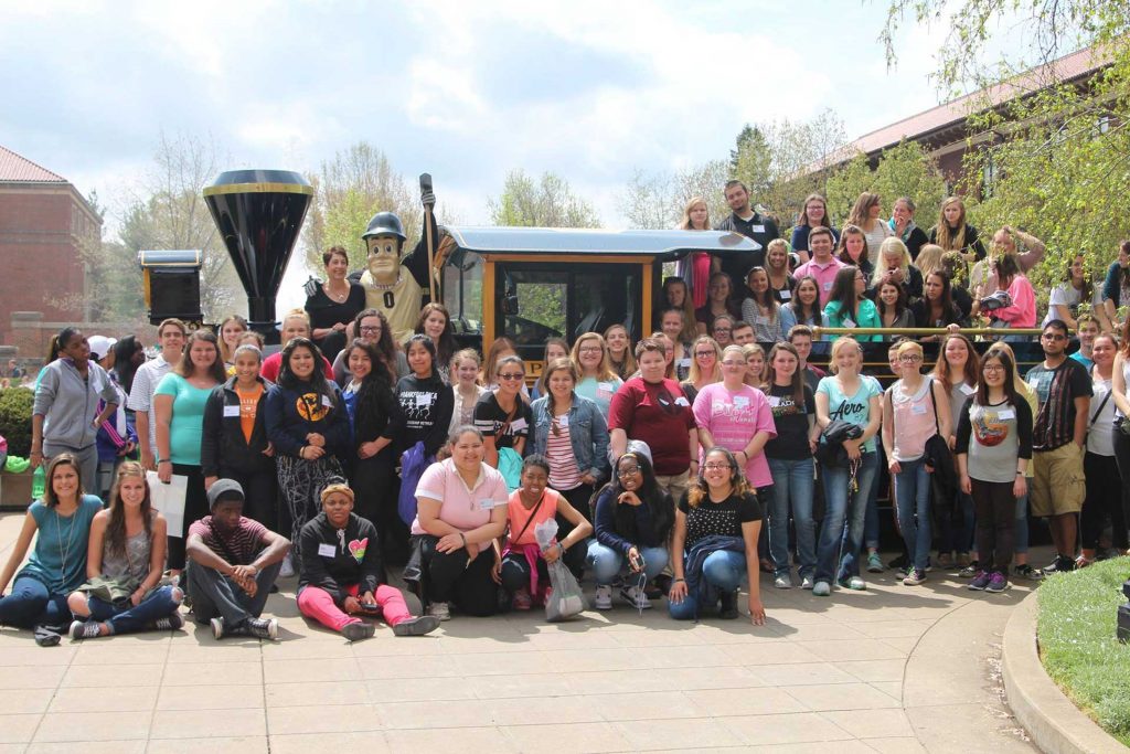 Group of Purdue students standing around the Boilermaker Special