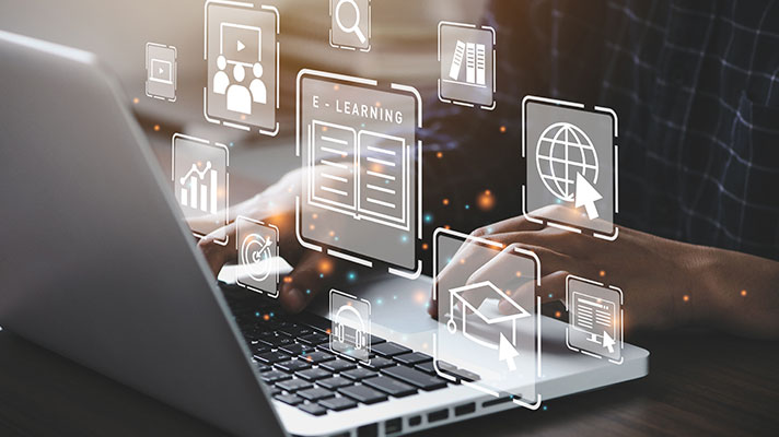 Hands are shown typing on a laptop, superimposed images of technology icons are shown above the hand, saying 