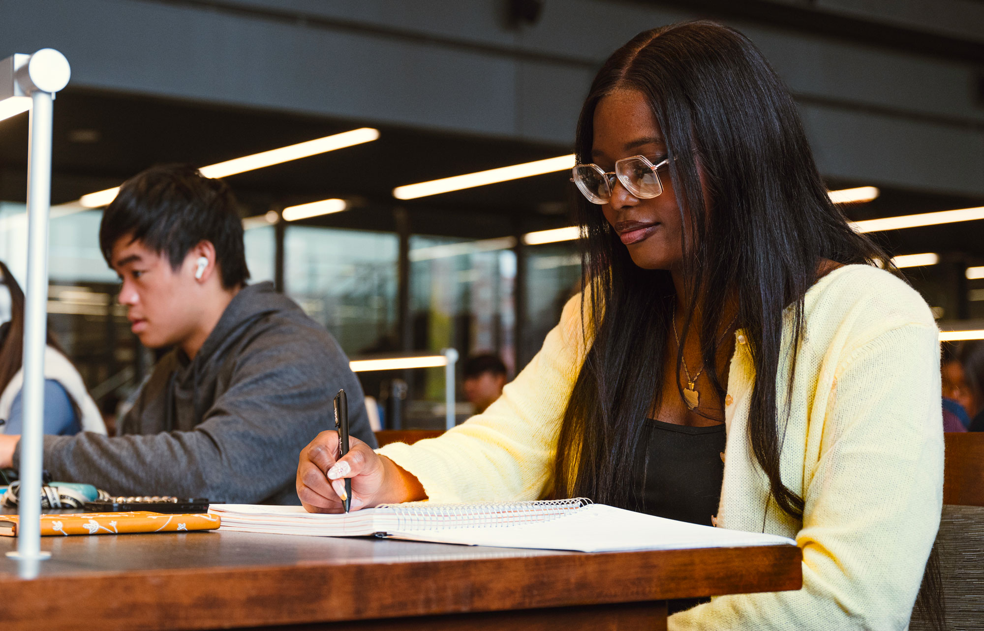 A student works on an assignment in the Purdue University library.