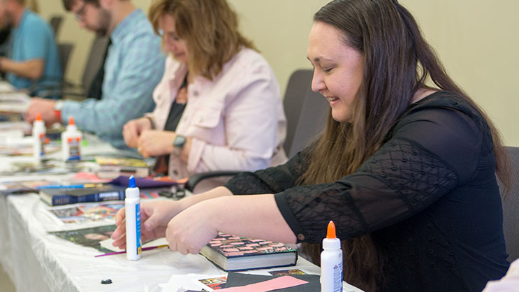 Educators work on a project at an Ackerman Center event