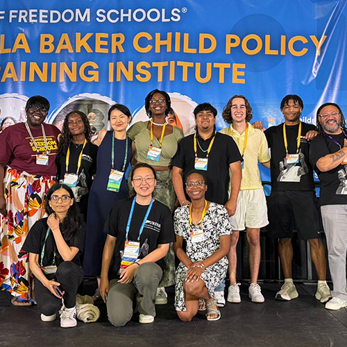 A group of researchers attend a conference