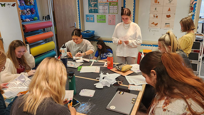 A group of Purdue University students work on projects in the CREATE lab