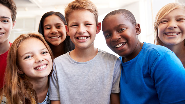 A group of diverse middle school students