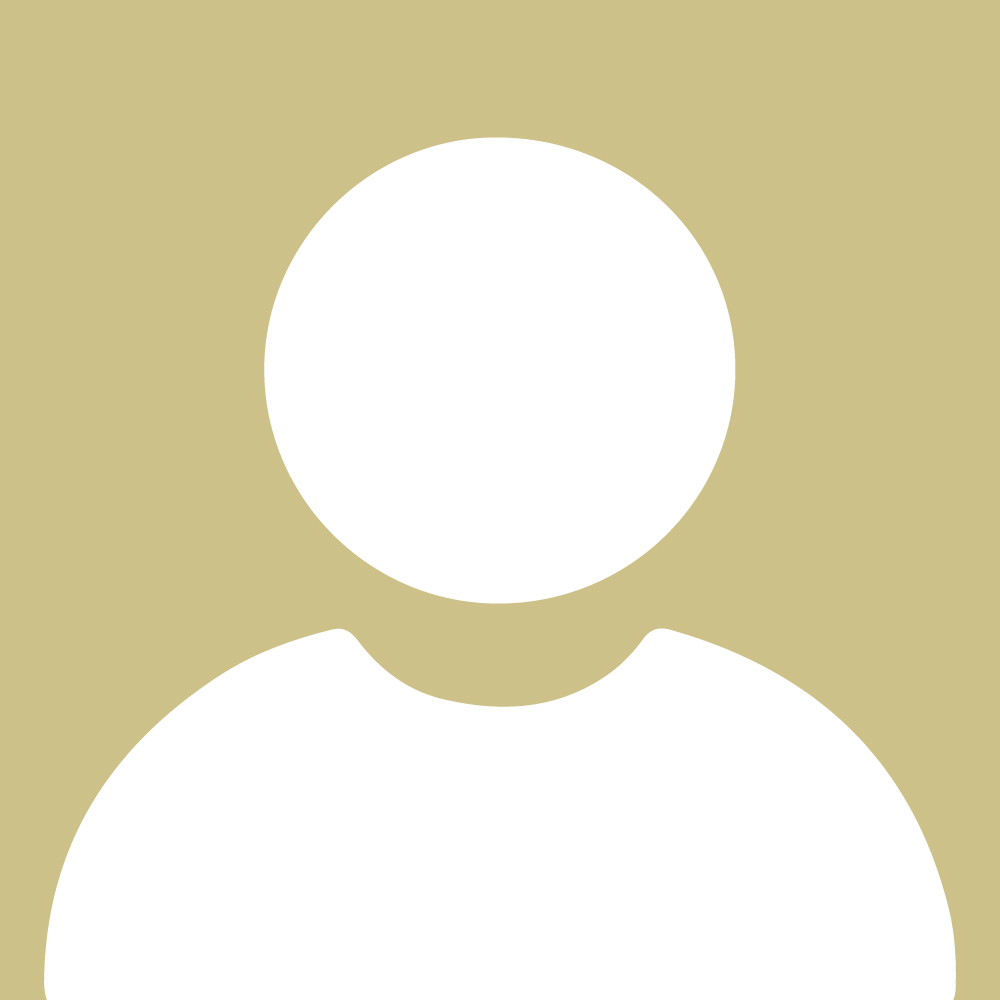 A gold and white placeholder image of a person.