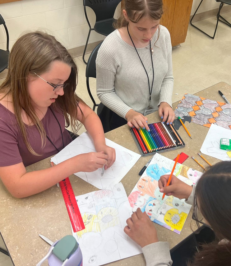 Students work on an art project during GER2I's Super Summer program