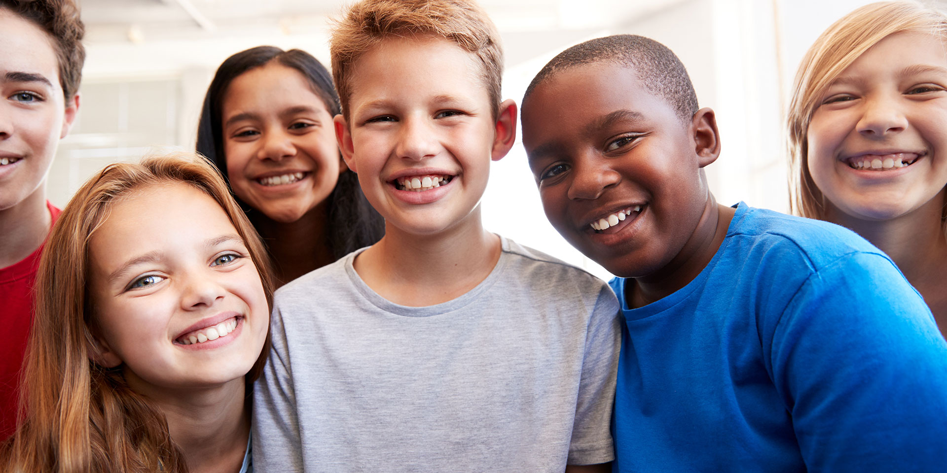 A group of diverse middle school students