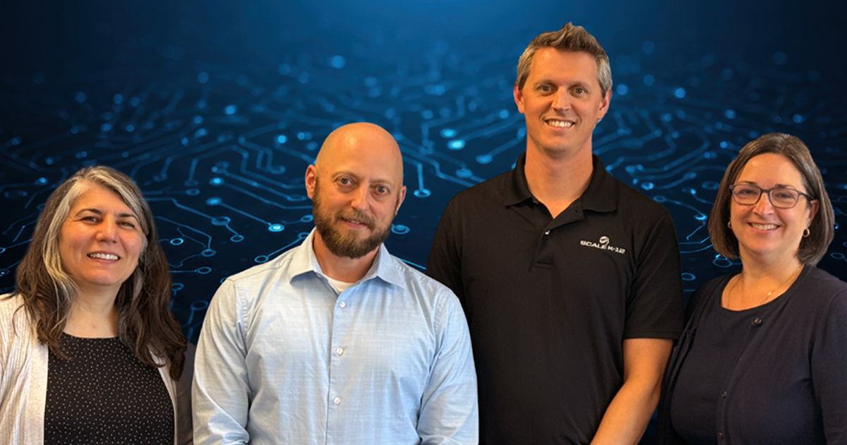 Selcen Guzey and three of her colleagues in front of a blue circuit pattern.