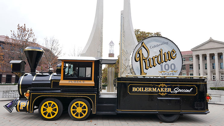 The Boilermaker Special parked in front of the Engineering Fountain on the Purdue University campus