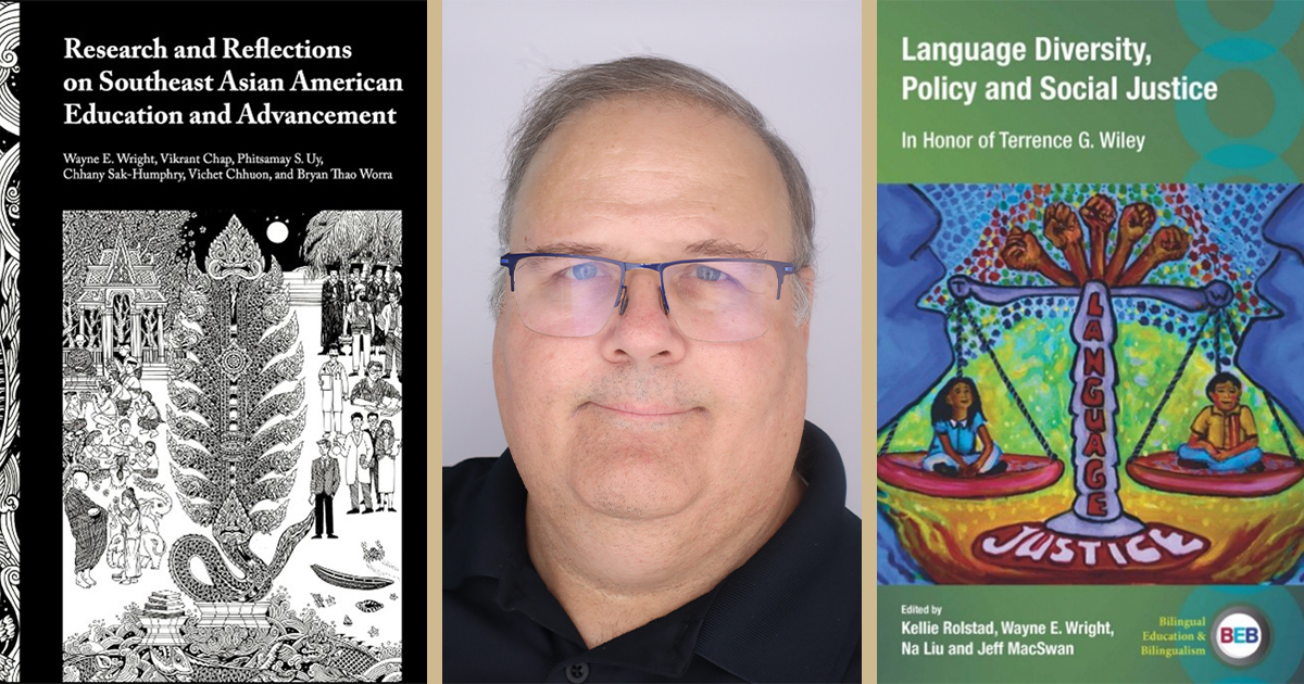 Wayne Wright surrounded by the covers of his two latest books.