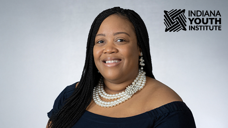 Breanya Hogue with the Indiana Youth Institute logo
