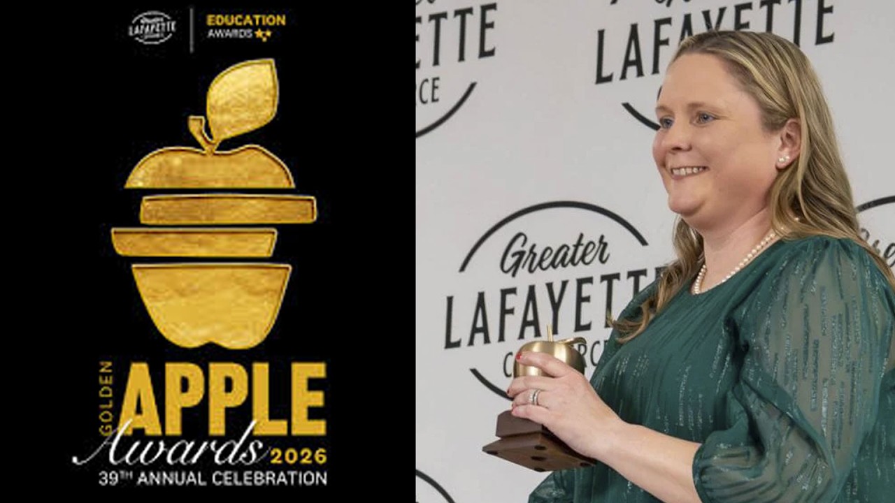 Sara Wright holding a Golden Apple Award. 